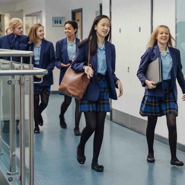 school-girls-walking-down-the-corridor