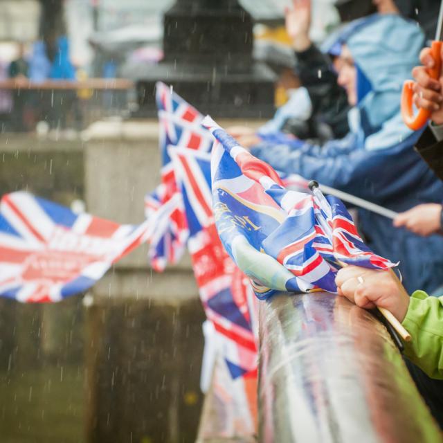 Image of members of public waving Union Jacks