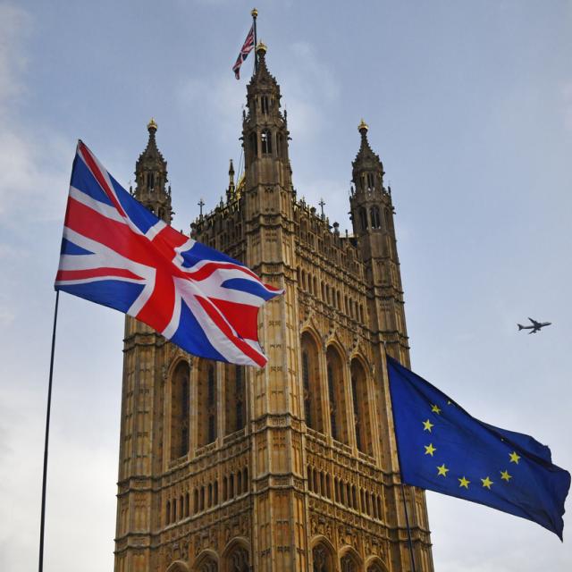Union Jack and EU flags outside Parliament