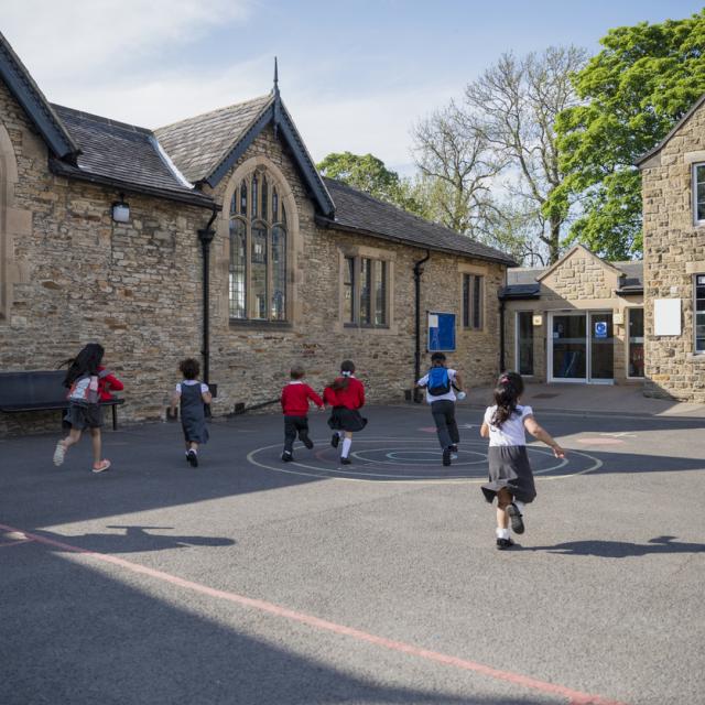 Children in school running