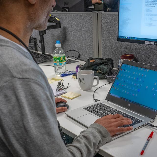 A person working at their desk