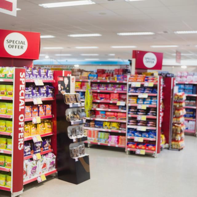 Photograph of shelves with promotions in a supermarket