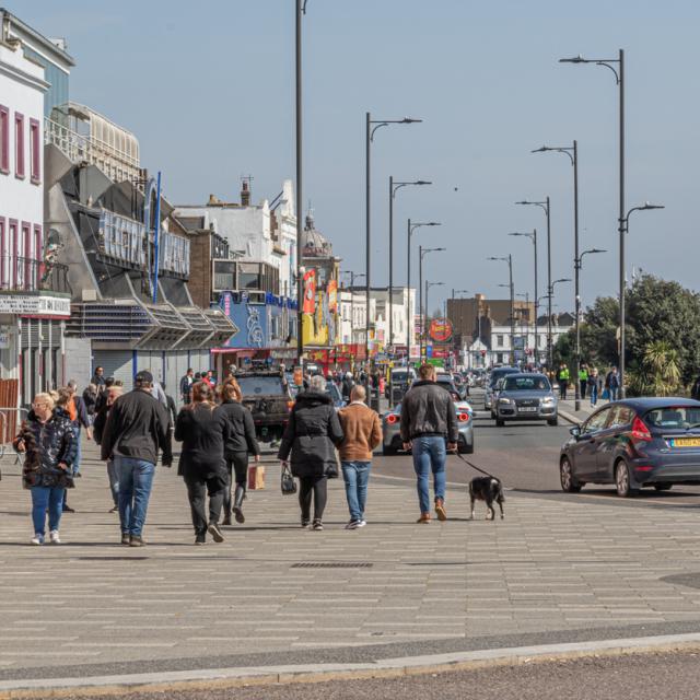 Southend seafront, Essex, England, United kingdom. Southend seafront from the bottom of Pier Hill with the amusements arcades on the left and people out walking.
