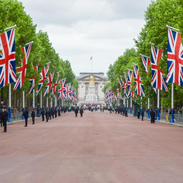 The Mall, London UK. Union jacks line the side of The Mall leading up to Buckingham Palace.