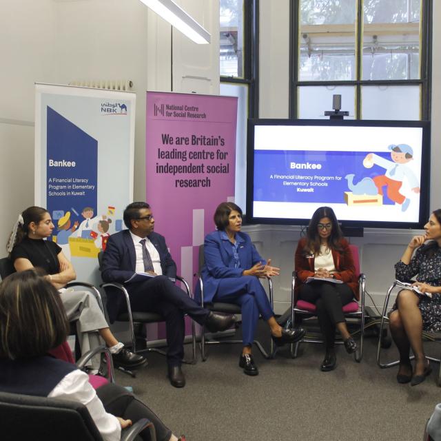 Group of 5-6 people in panel discussion - National Centre for Social Research event 
