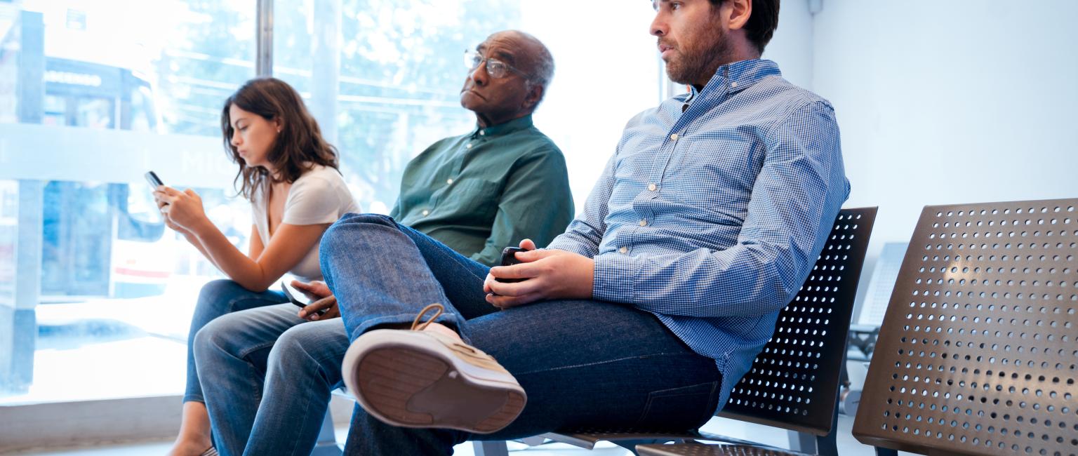 People in a surgery waiting room UK