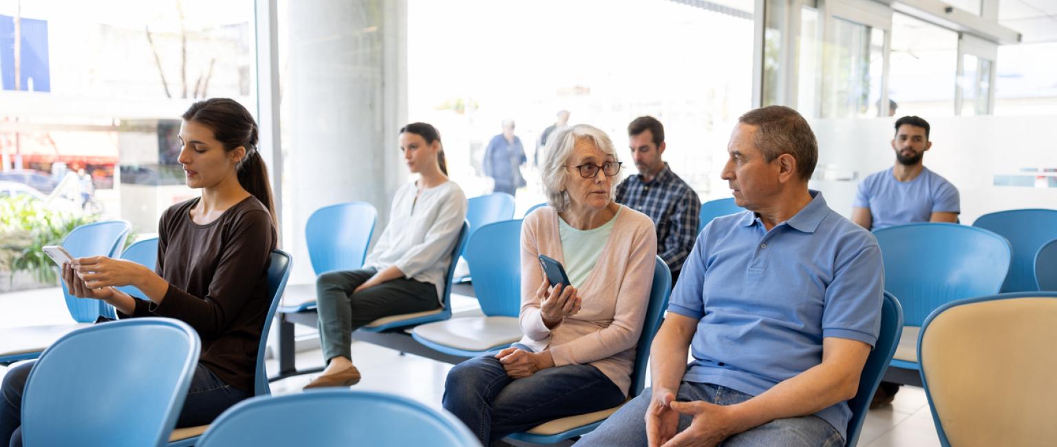 Woman in the waiting room at the hospital or GP office.