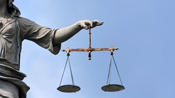Image of statue of scales of justice