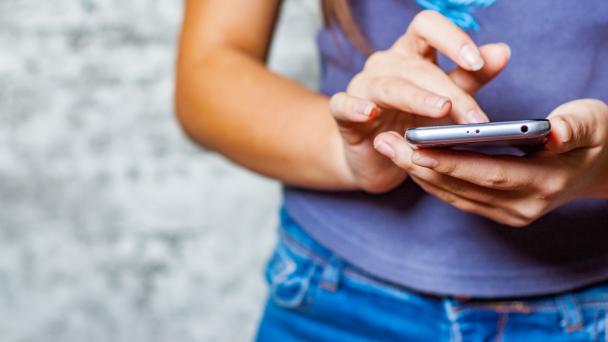 Young person using smartphone