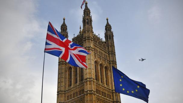 Union Jack and EU flags outside Parliament