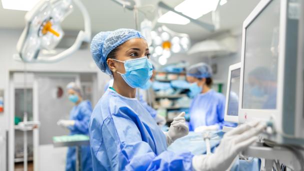 Anesthetist working in operating theatre