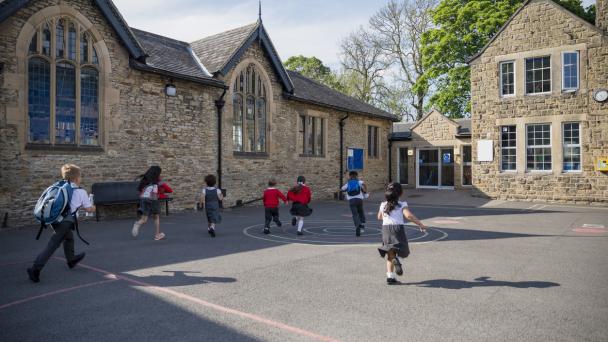 Children in school running