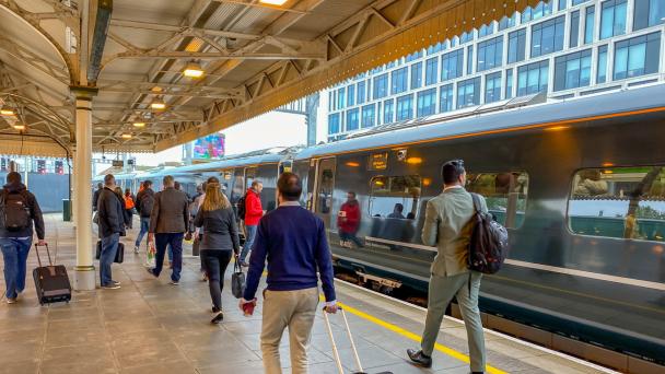 People boarding a London bound high speed train 