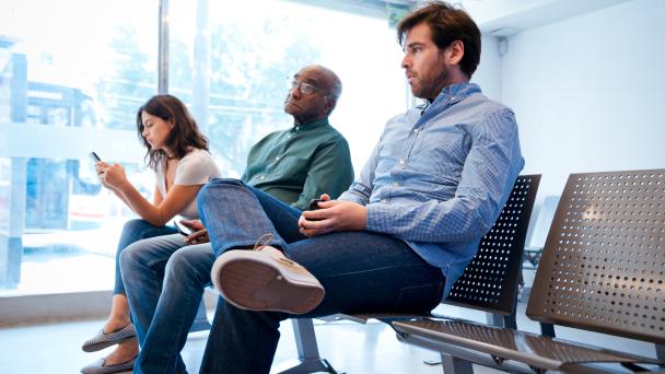 People in a surgery waiting room UK