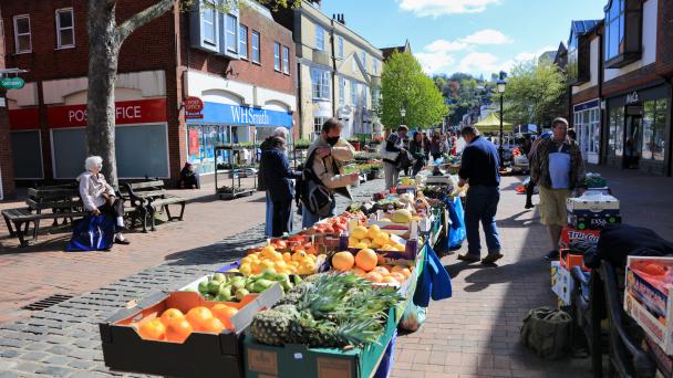 Lewes, England. Market stalls along Cliffe High St in Lewes busy with visitors.