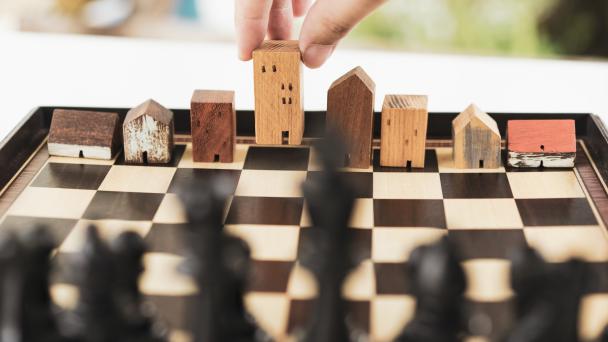 A chess board with different houses resembling the game pieces