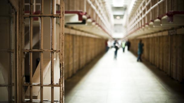 Corridor of a prison with cells.