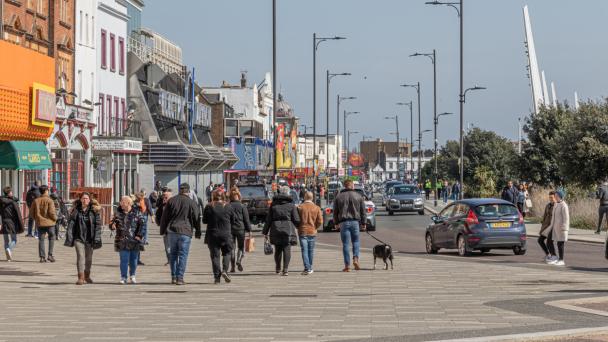 Southend seafront, Essex, England, United kingdom. Southend seafront from the bottom of Pier Hill with the amusements arcades on the left and people out walking.