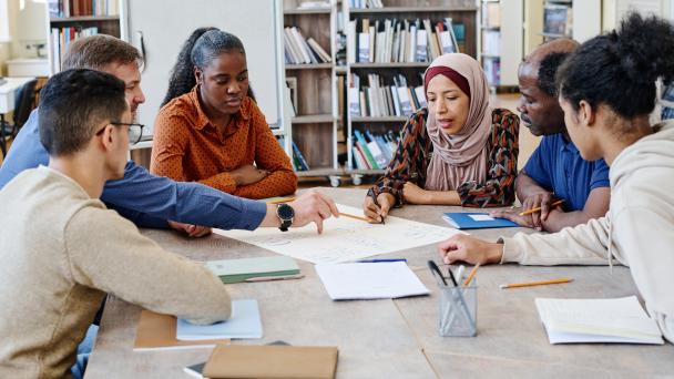 Group of colleagues collaborating around a table