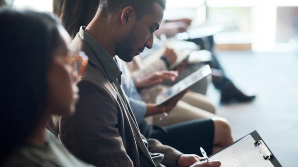 A man taking notes
