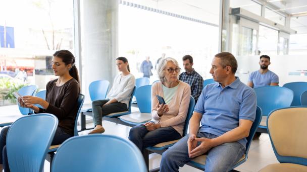Woman in the waiting room at the hospital or GP office.