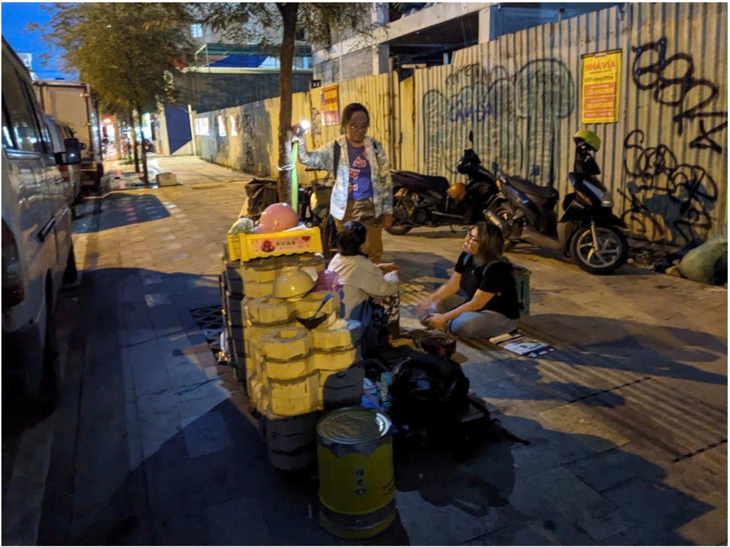 Woman using temporary shelter in Ho Chi Minh City. 